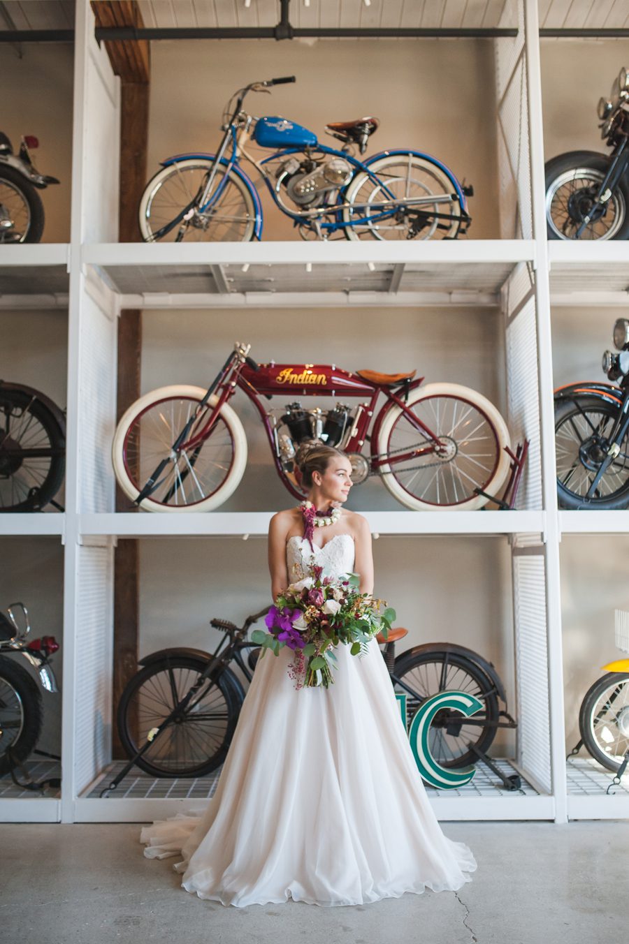 wedding photography at warehouse 109 - bride in front of motorcycles