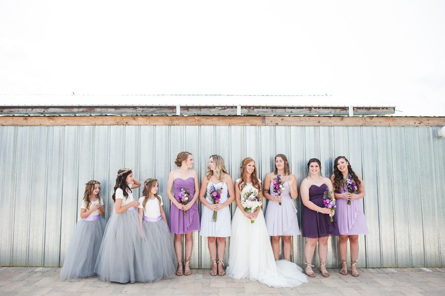 wedding photograph at emerson creek pottery and tea room - bridesmaids in purple