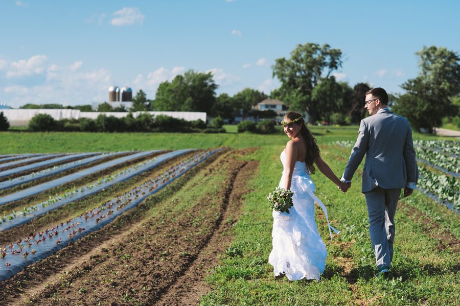 heritage prairie farm wedding photographer – walking through the field