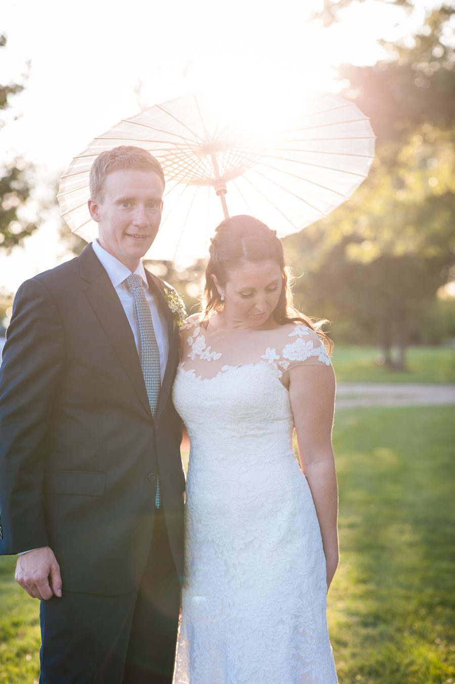 reception at sunset – bride and groom having fun