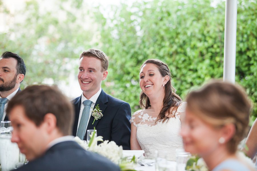 reception at sunset – bride and groom having fun