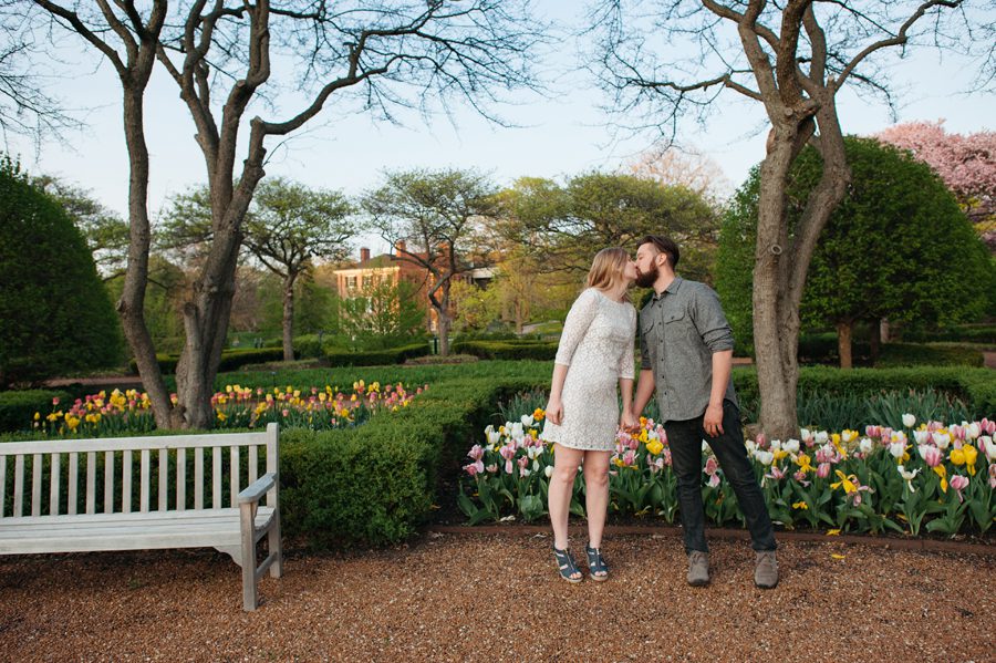 colorful spring engagement session with flowering trees