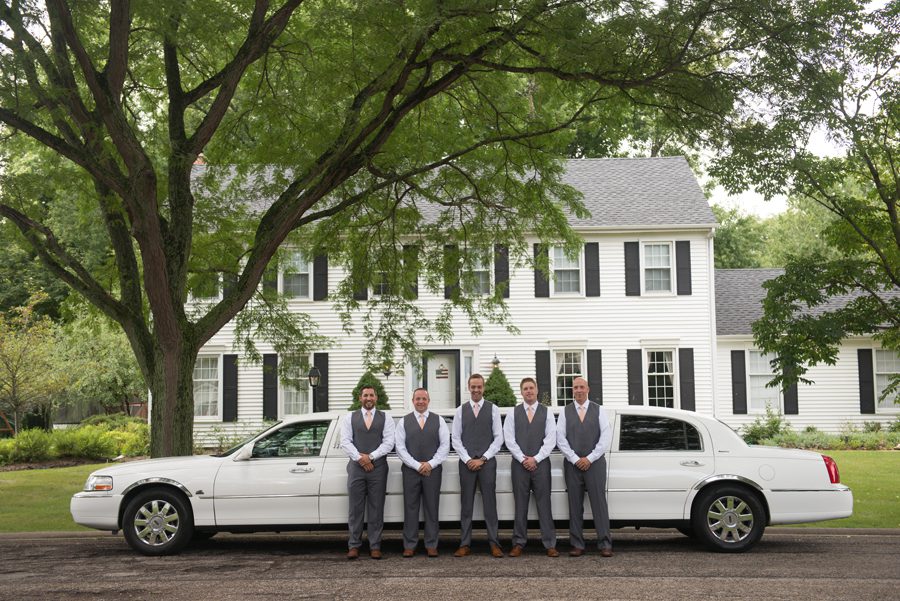 guys getting into the limo {west chicago wedding photographer}