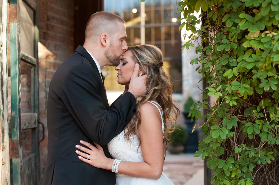 kiss from the groom {blumen gardens wedding photographer}