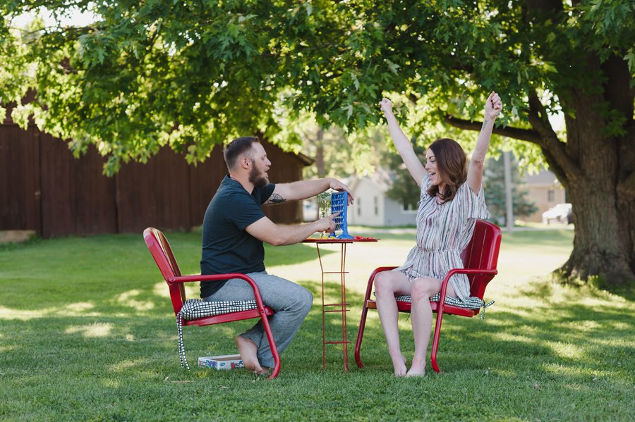 sandwich illinois engagement photographer - playing connect four