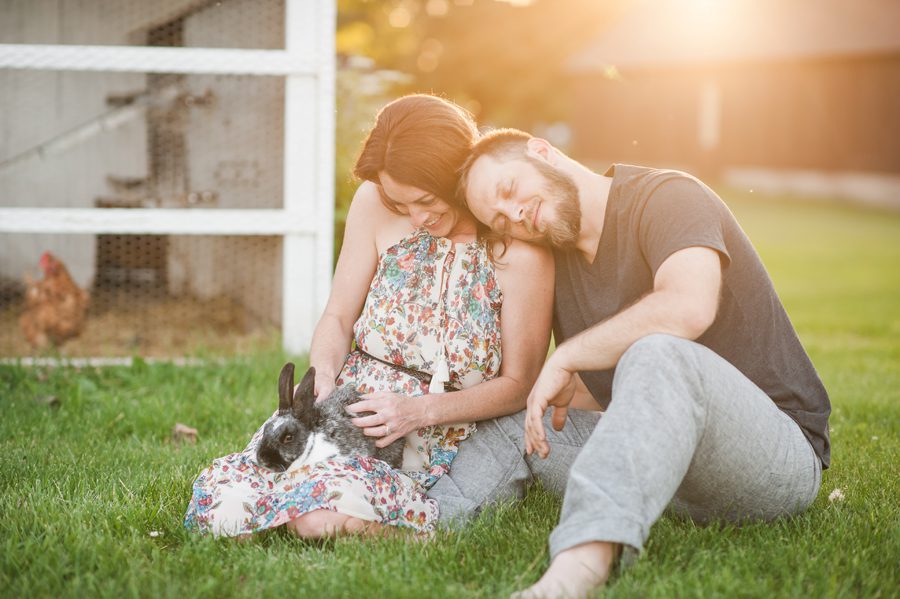 engagement photographer - couple holding a rabbit - sandwich illinois