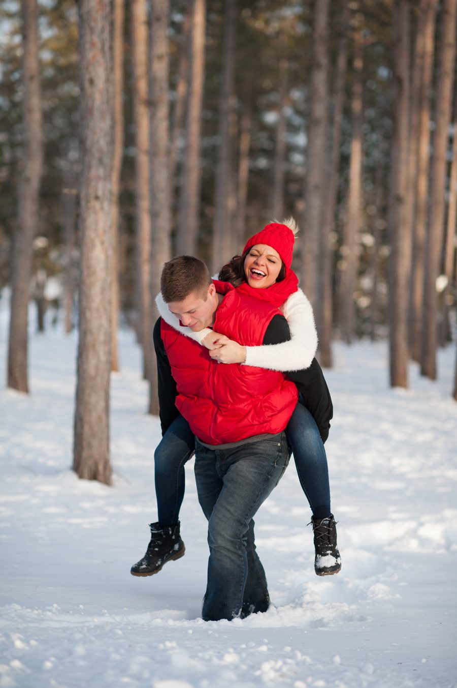 boyfriend carries fiance through the snow - engagement 